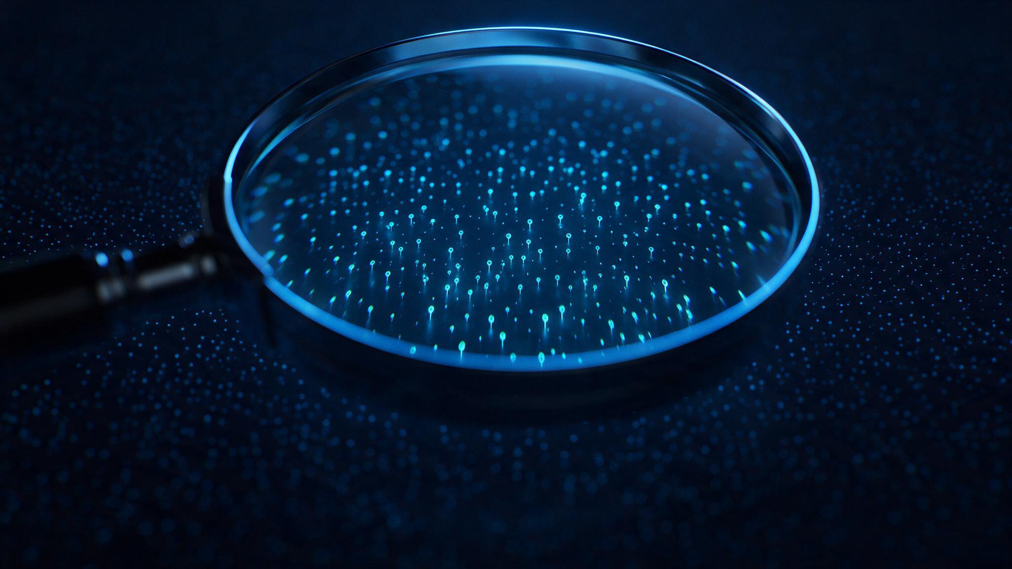 Lupa sobre um campo de pontos de luz, ampliando cada ponto individualmente